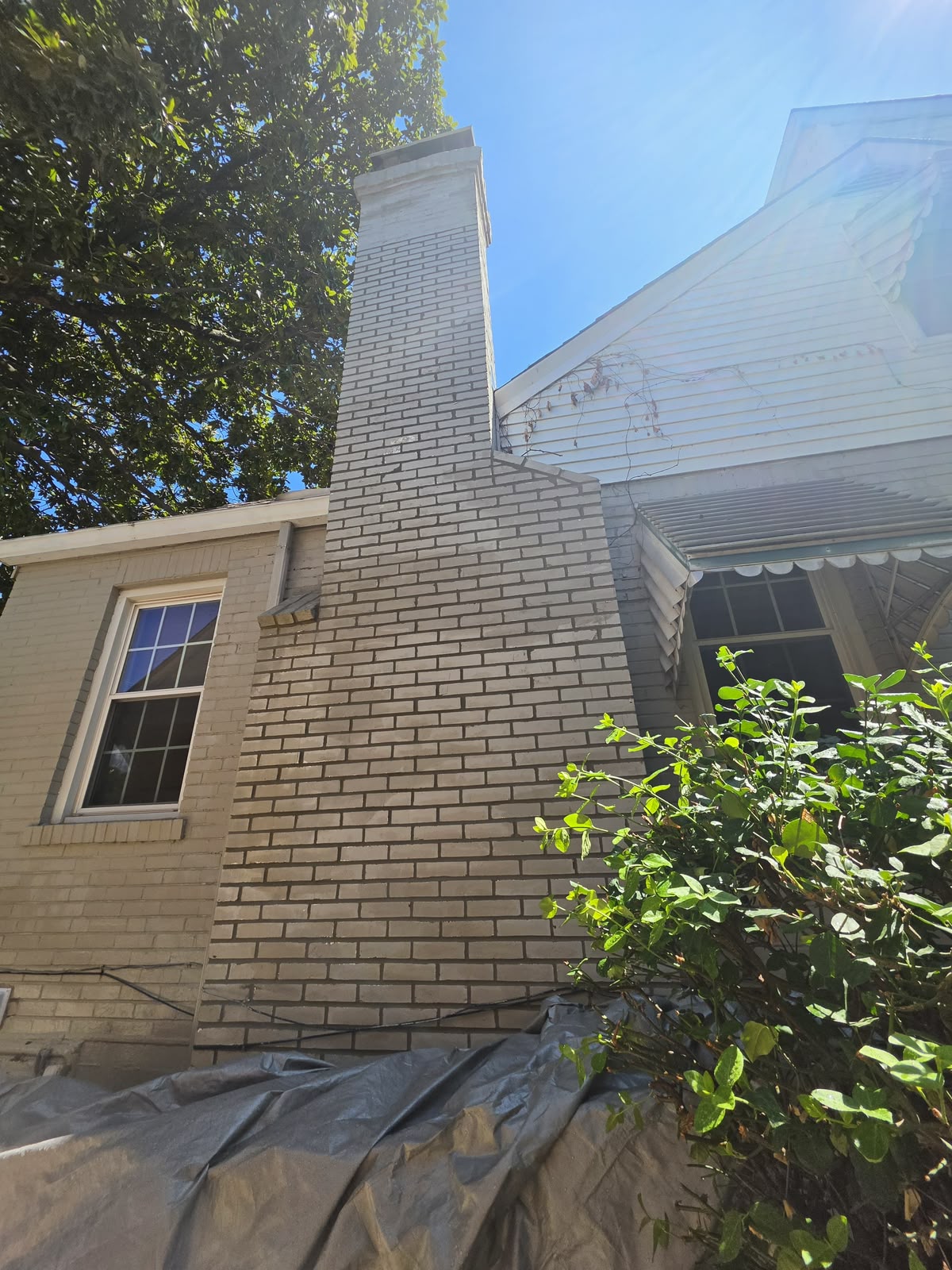 Chimney with fresh mortar in every joint after the tuckpointing was completed