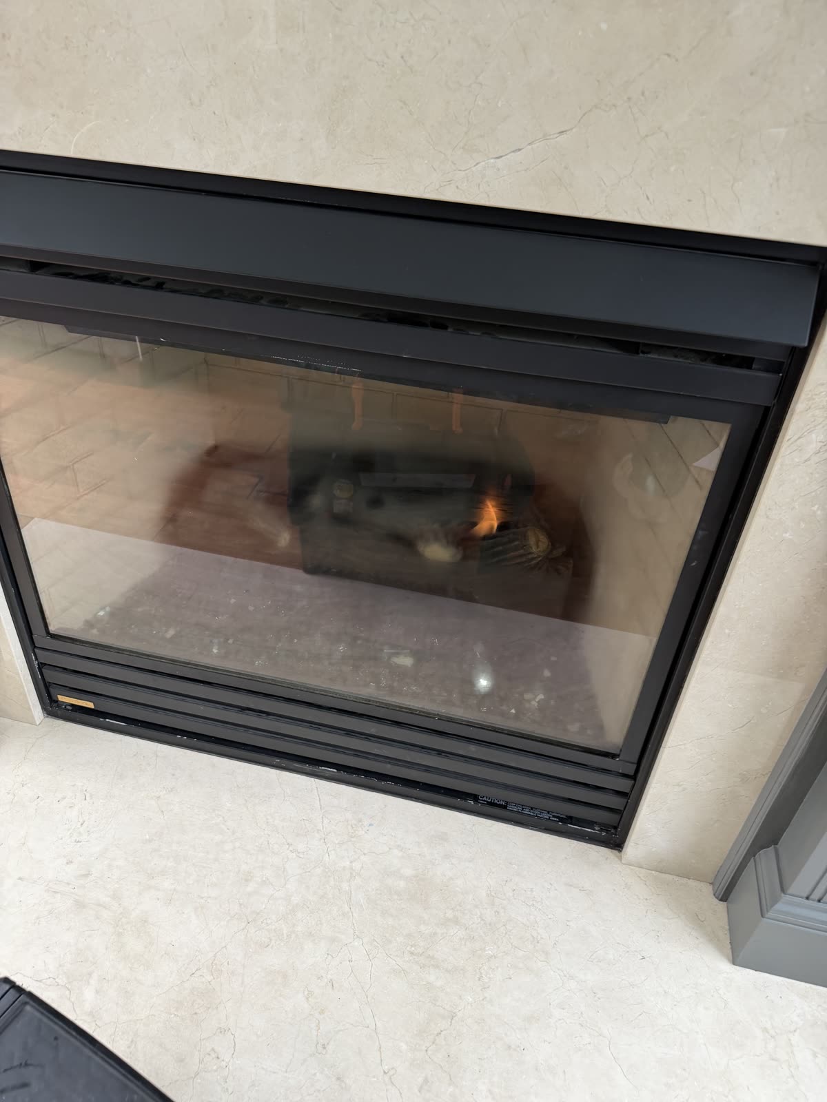 A gas fireplace running correctly after AirPlease Missouri Chimney Services identified and corrected the fault